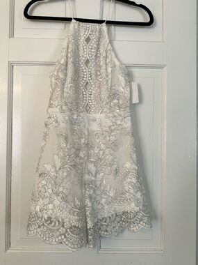 White Lace Romper. Halter top. New with tags.